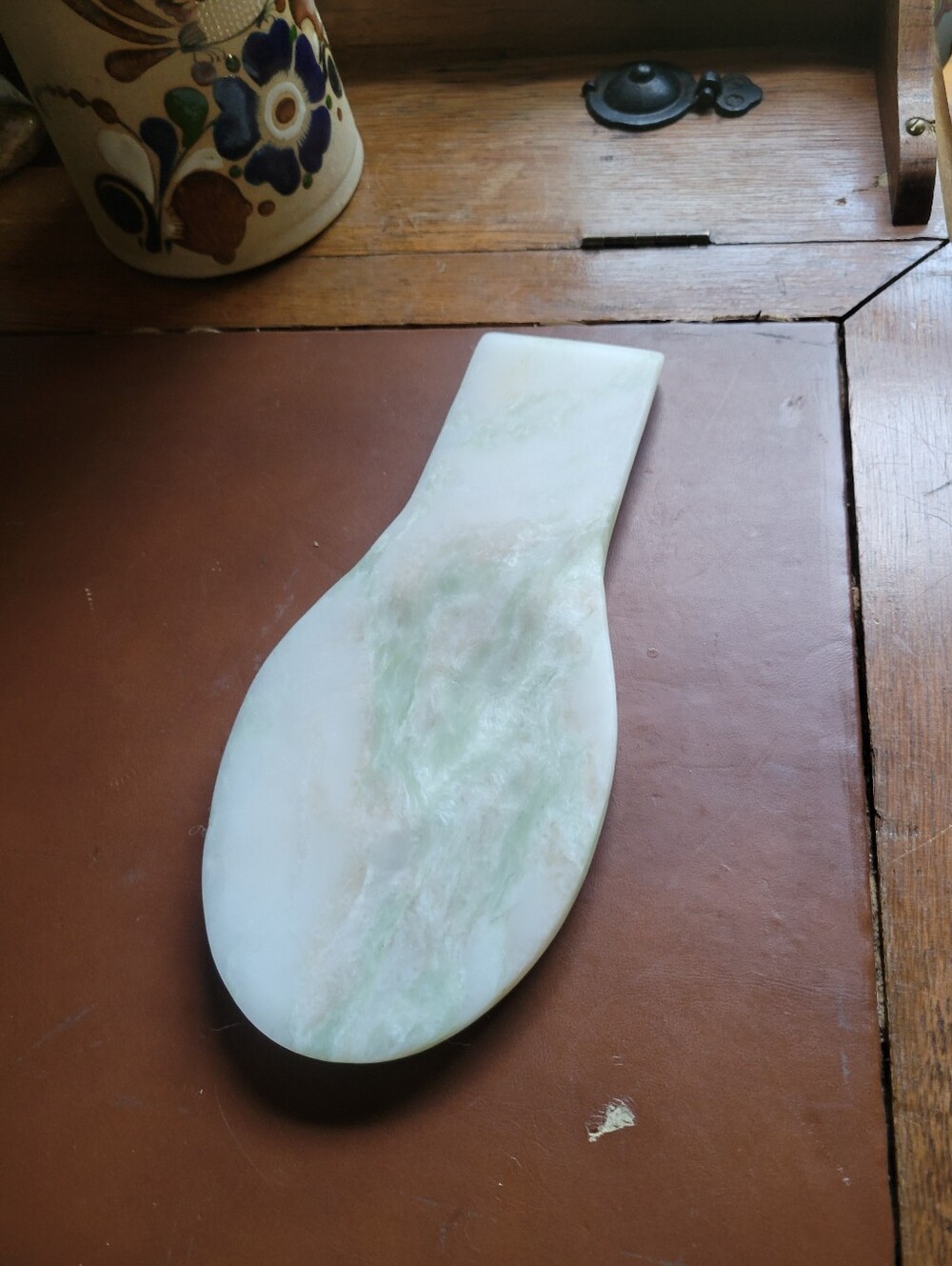 Green and white swirled marble spoon rest